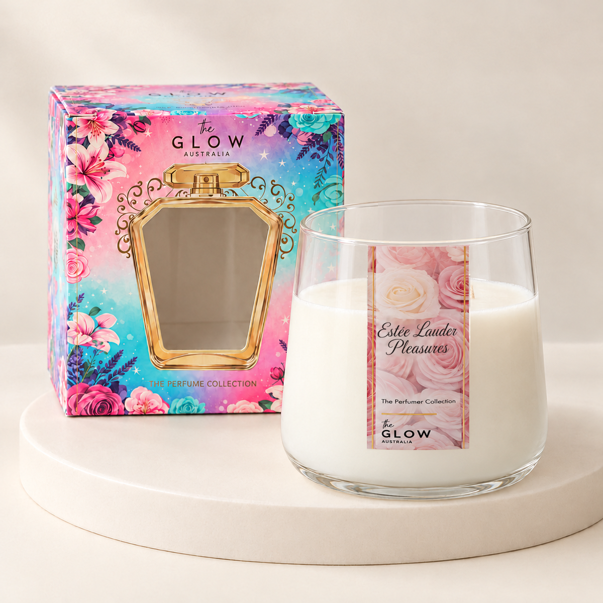Pure Petals Perfumer candle in a rounded clear glass jar with rose label, cream wax and floral gift box on an ivory plinth